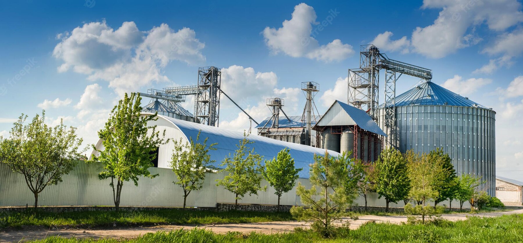 agricultural-silos-storage-drying-grains-wheat-corn-soy-sunflower-against-sky_234715-629